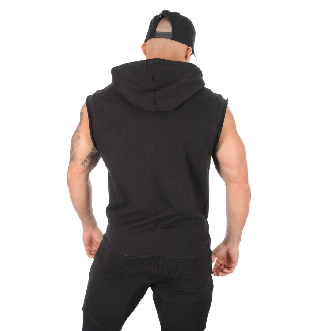 Person wearing a black sleeveless hoodie and pants on a white background