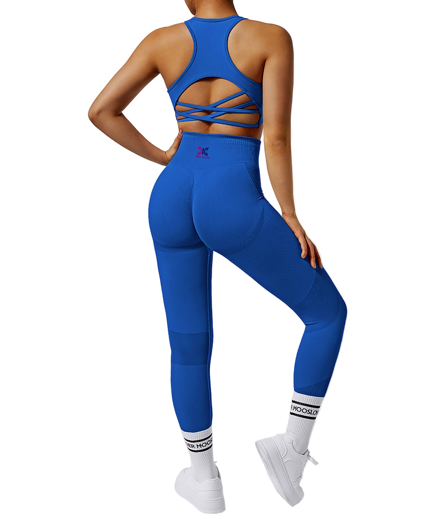 Person wearing a blue athletic outfit with a white background