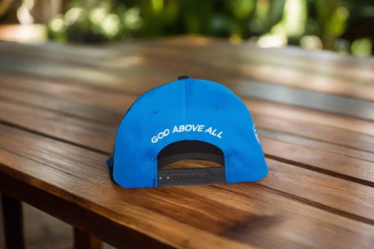 Blue cap with 'GOO ABOVE ALL' text on a white background