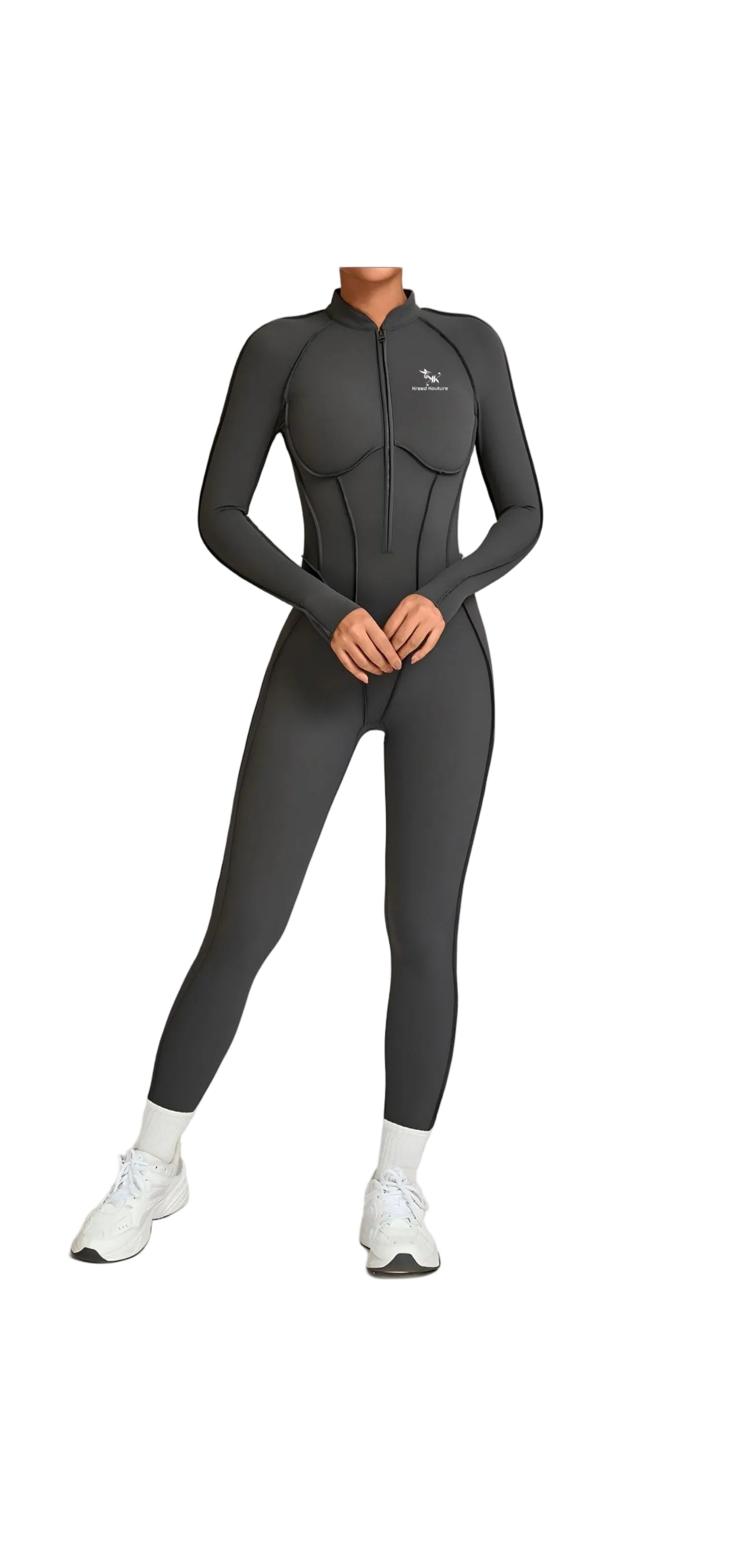 Person wearing a black wetsuit on a plain background