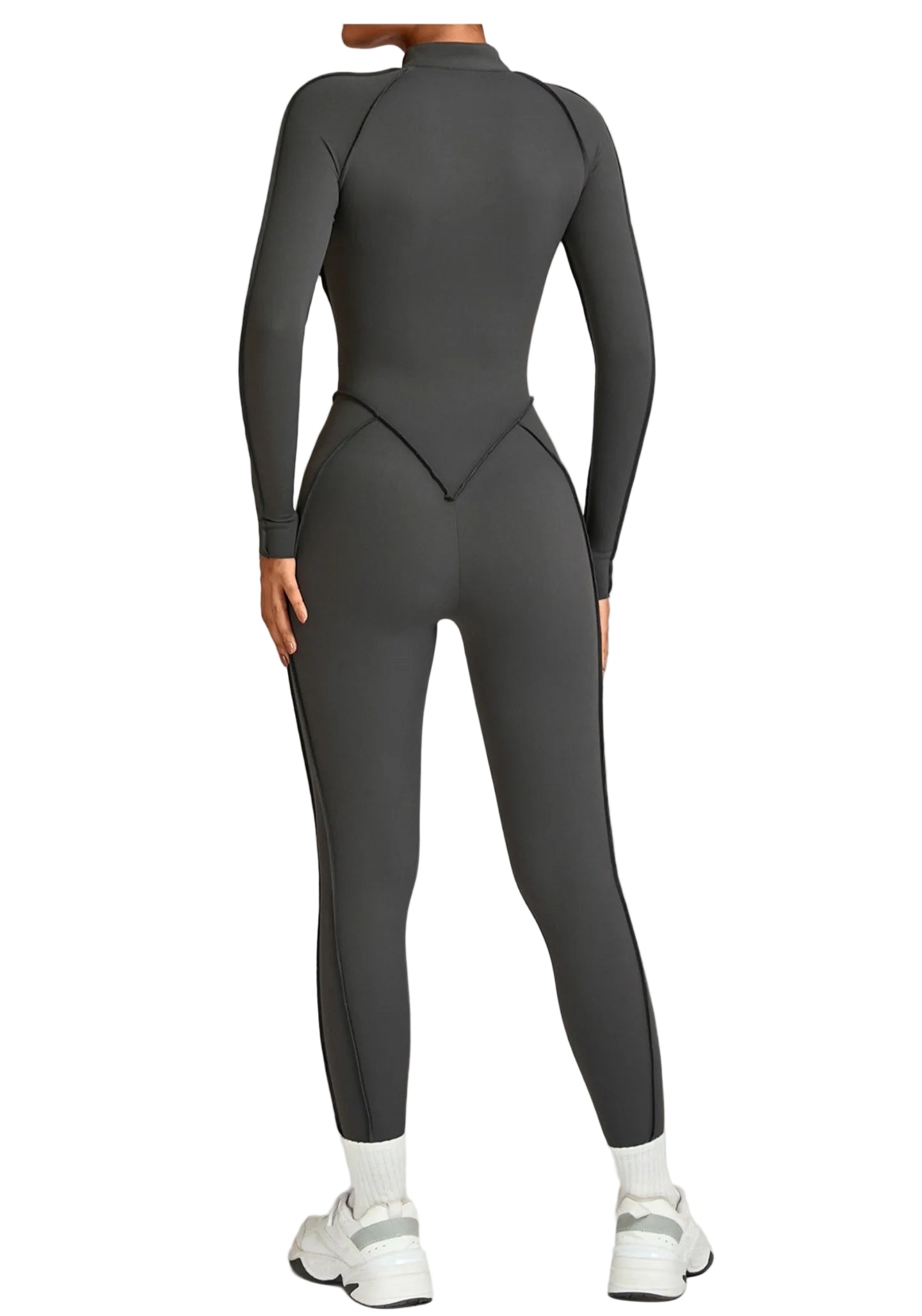 Person wearing a gray full-body suit on a light gray background