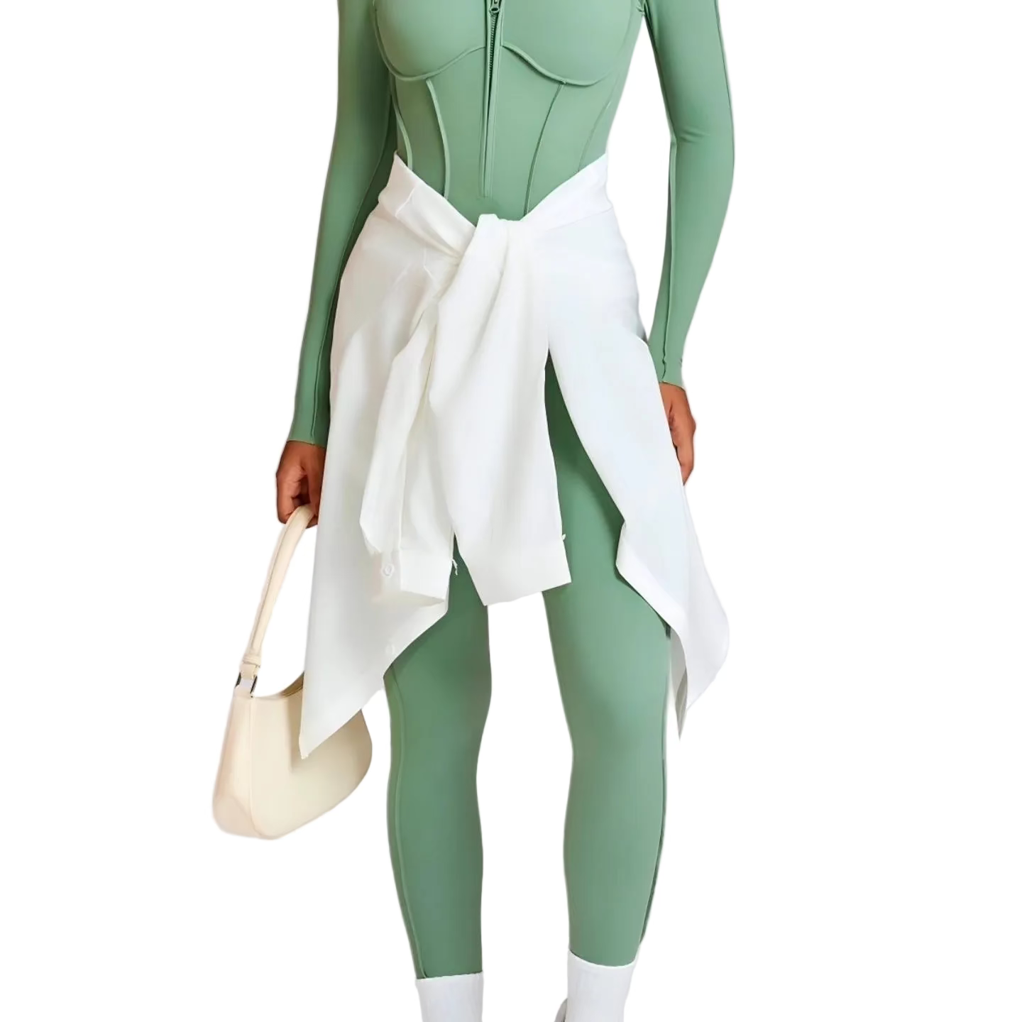 Person wearing a green bodysuit with white ruffled accents on a light gray background