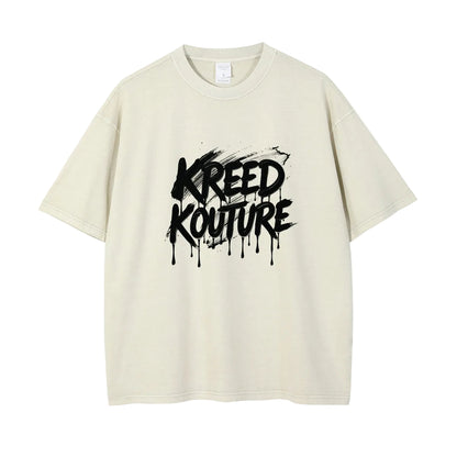 Beige t-shirt with 'Kreed Kouture' graphic design on a white background
