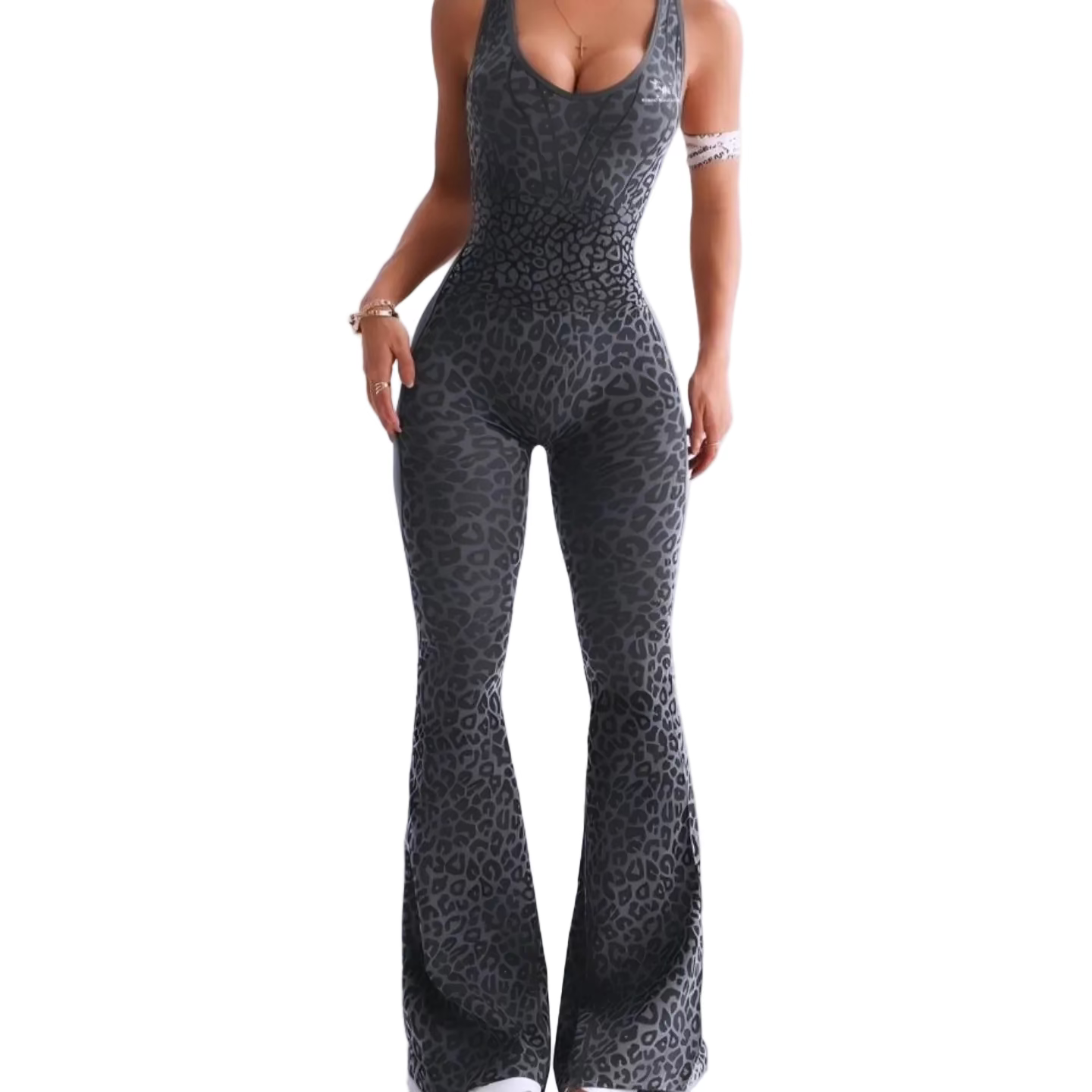 Leopard print jumpsuit worn by a person on a white background