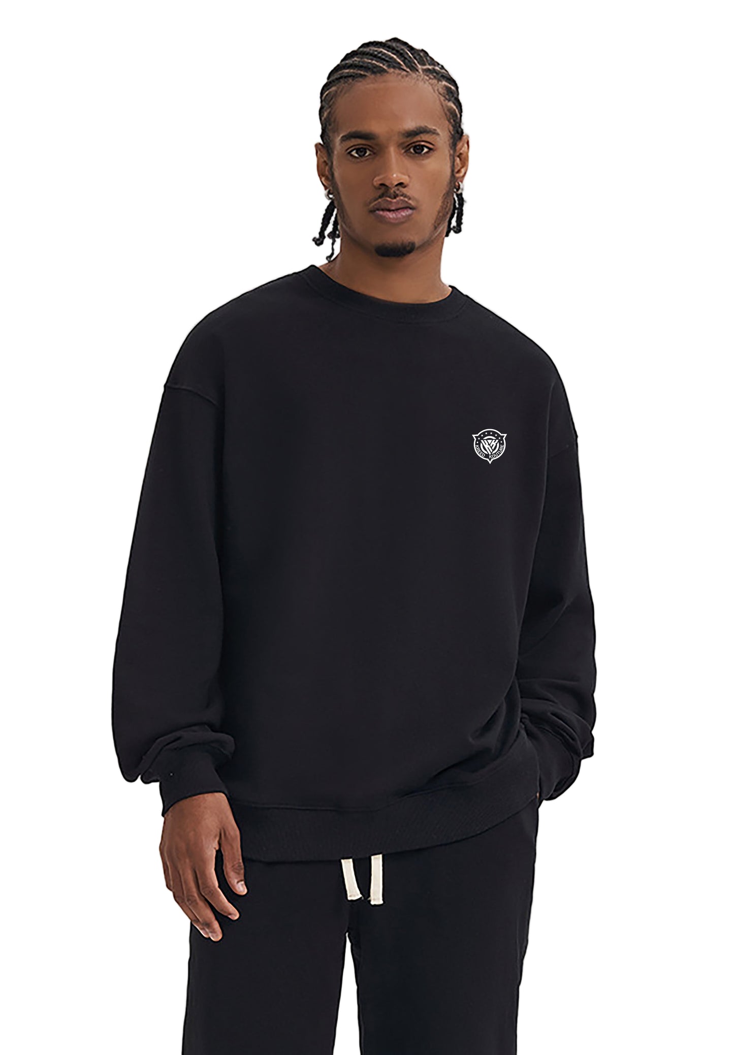 Person wearing a black sweatshirt with a logo on a white background