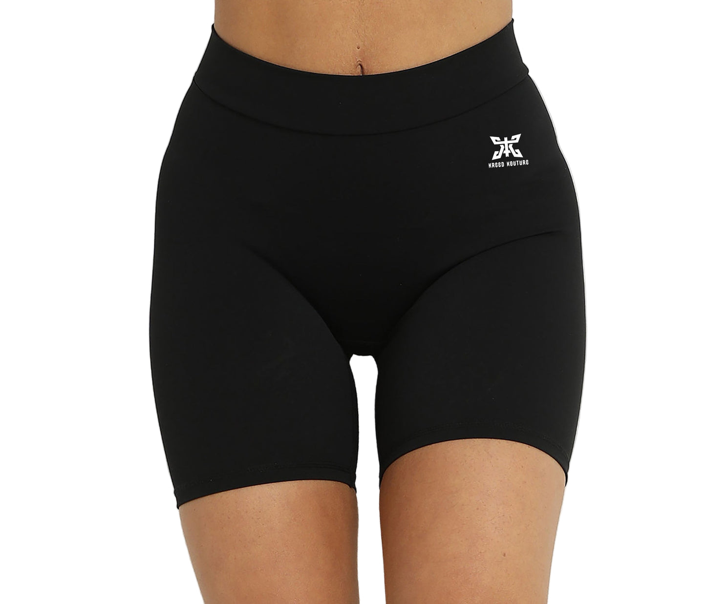 Black athletic shorts with a logo on a neutral background