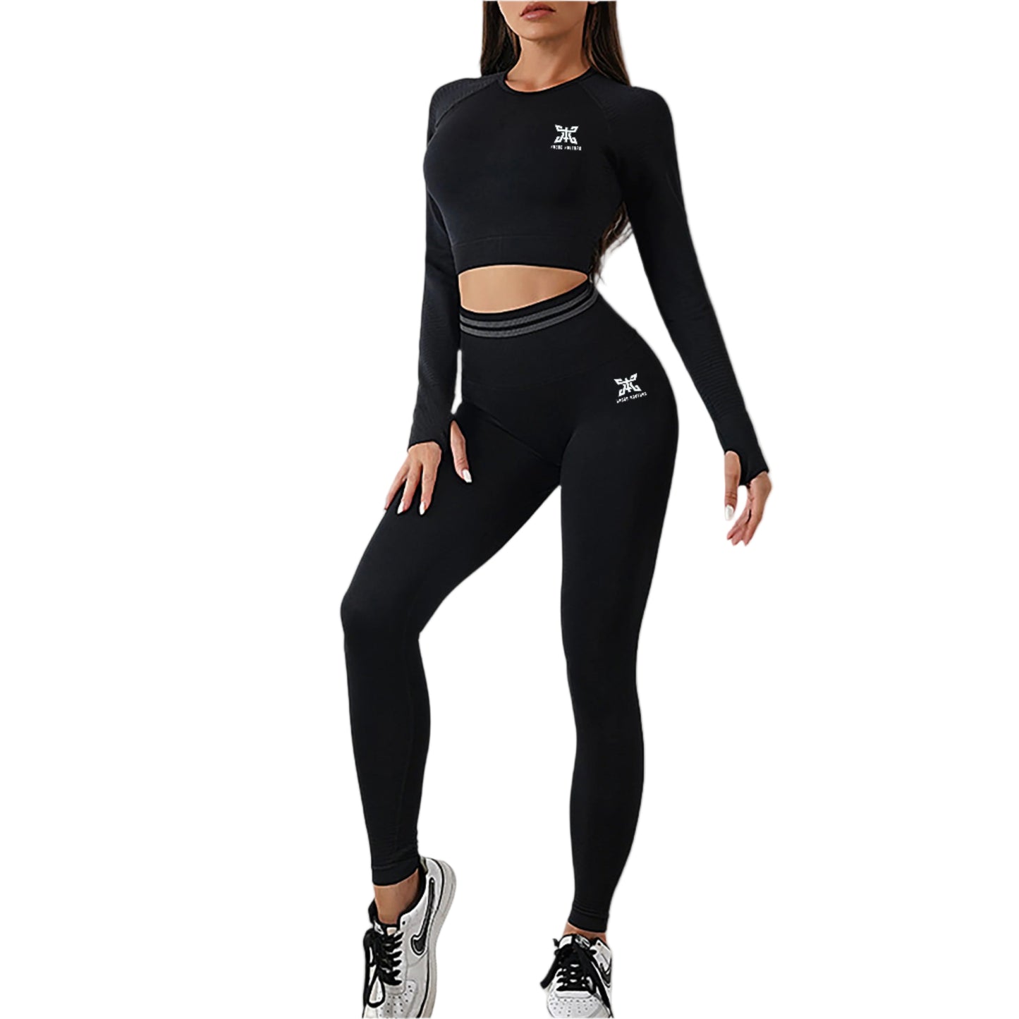 Person wearing a black athletic outfit with a logo on a plain background