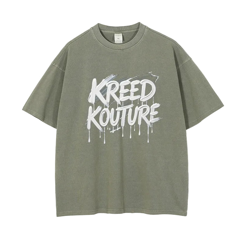 Green t-shirt with 'KREED KOUTURE' text on a white background