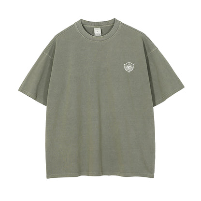 Green t-shirt with a small logo on a white background