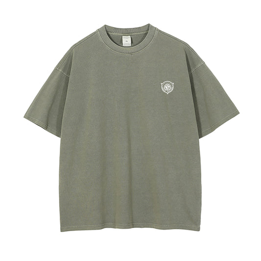 Green t-shirt with a small logo on a white background