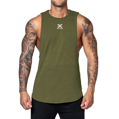 Man wearing a green tank top with a logo on a light gray background