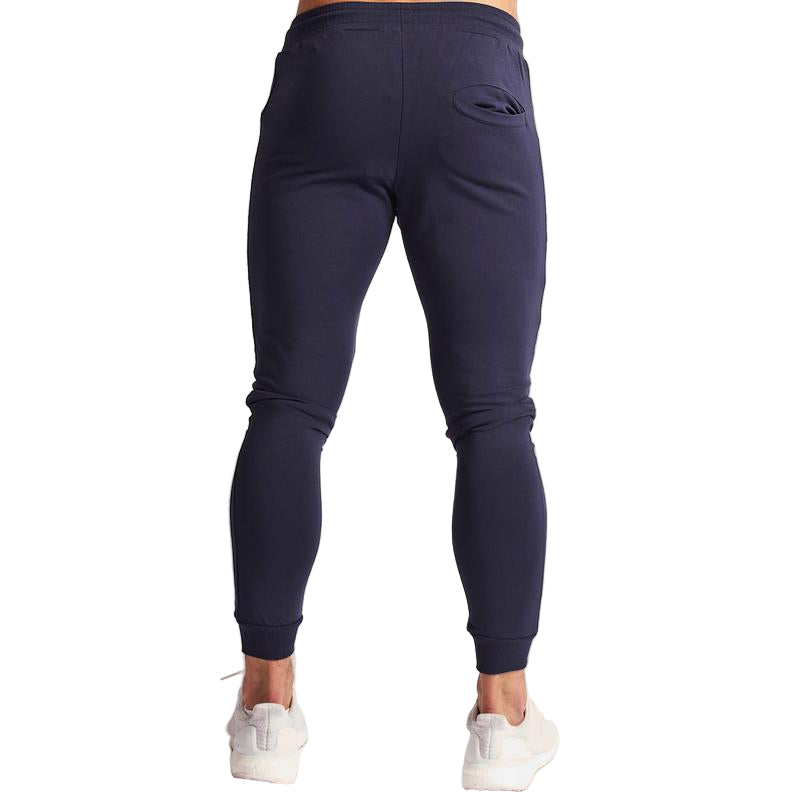 Navy blue jogger pants on a white background