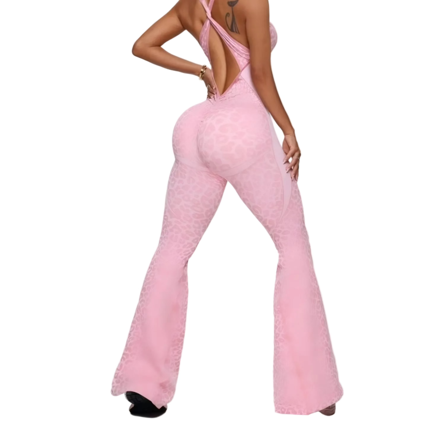 Pink bell-bottom pants worn by a model on a white background