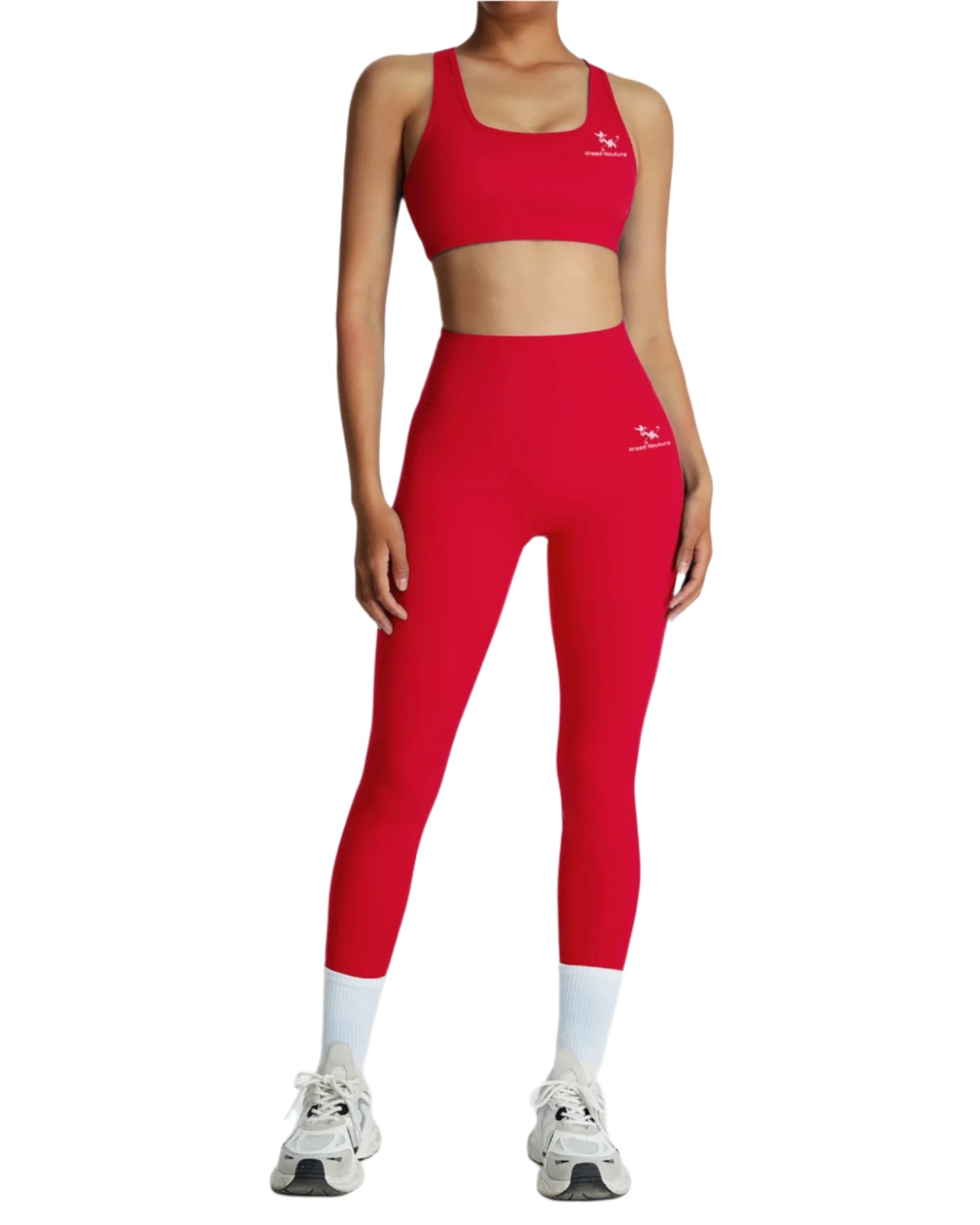 Person wearing a red sports bra and leggings set with a logo on a white background