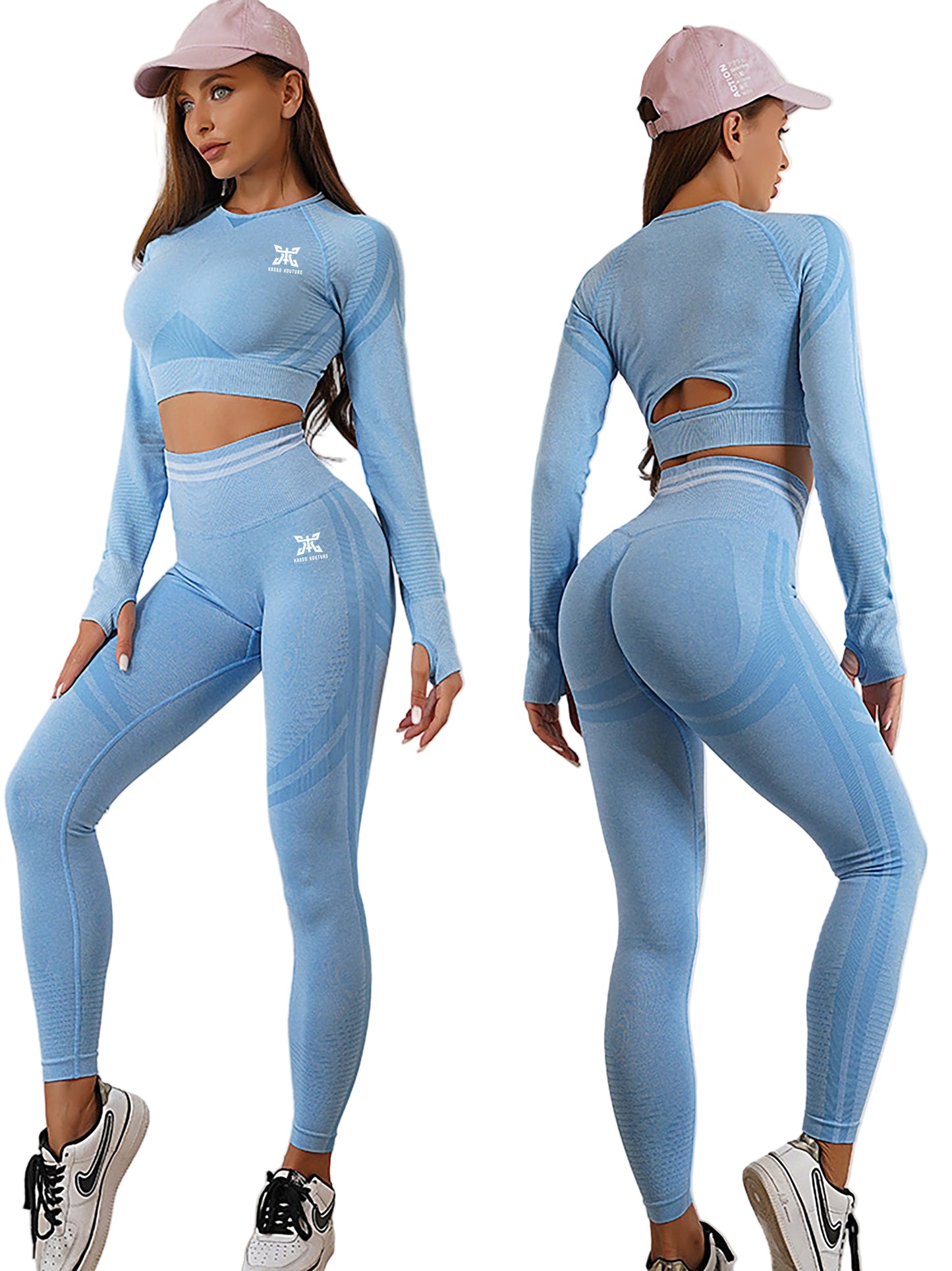 Woman wearing a blue athletic outfit with cut-out design on a plain background