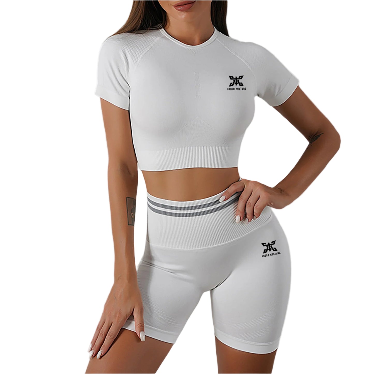 Person wearing a white athletic outfit with a logo on a gray background