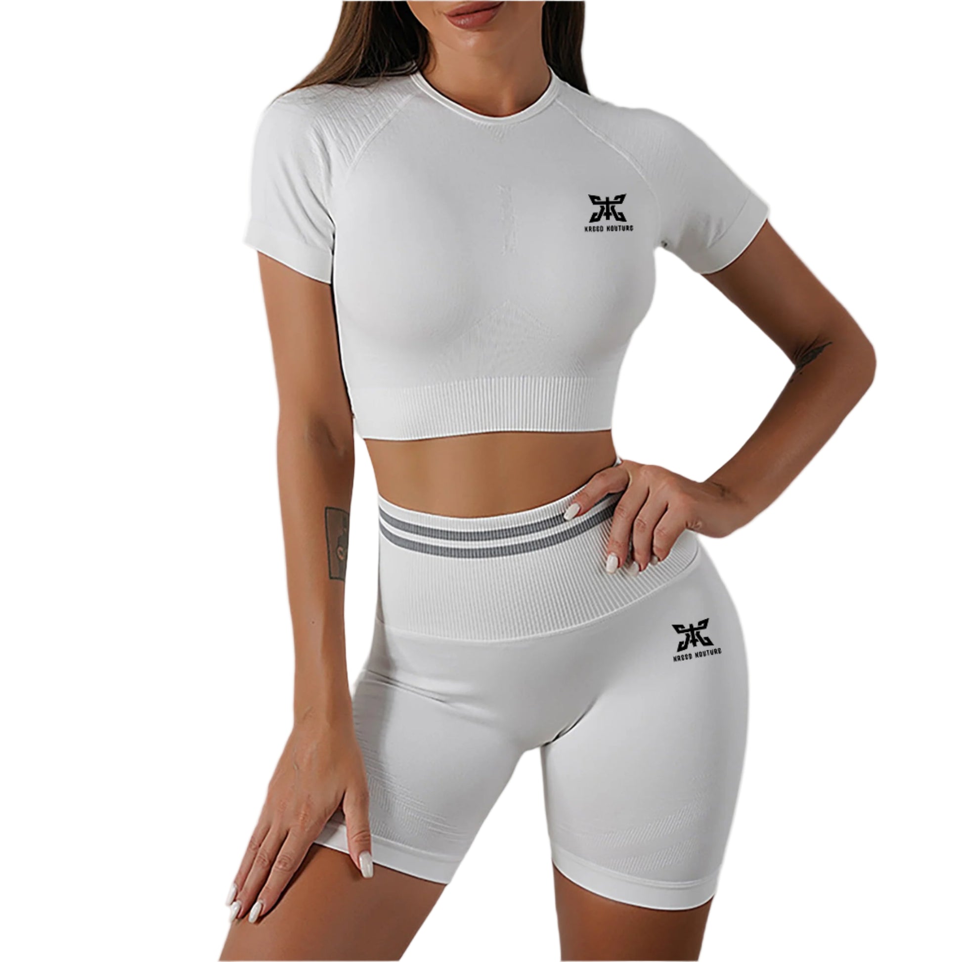 Person wearing a white athletic outfit with a logo on a gray background